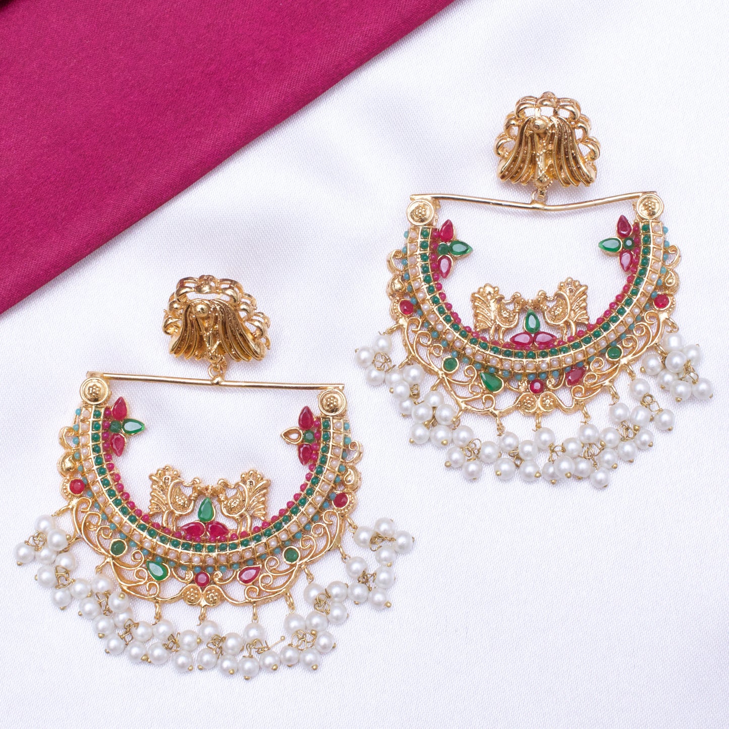 HALF CUT PEACOCK EARRINGS