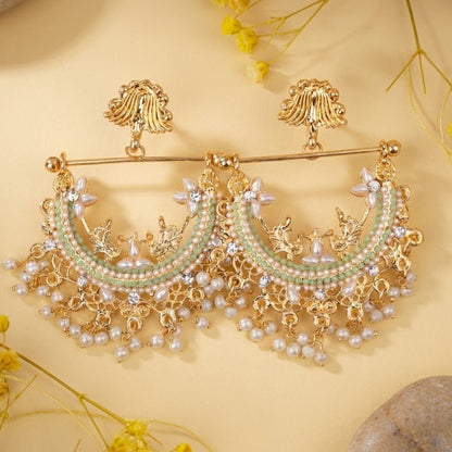 HALF CUT PEACOCK EARRINGS 02
