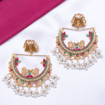 HALF CUT PEACOCK EARRINGS